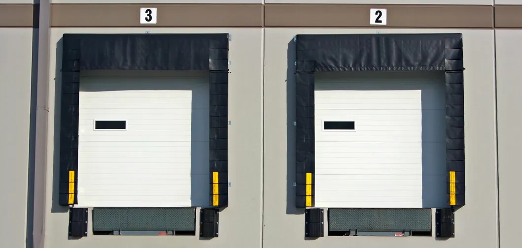 Low Price Warehouse/Logistic Loading Dock Sectional Sliding Industrial Doors Manufacturer